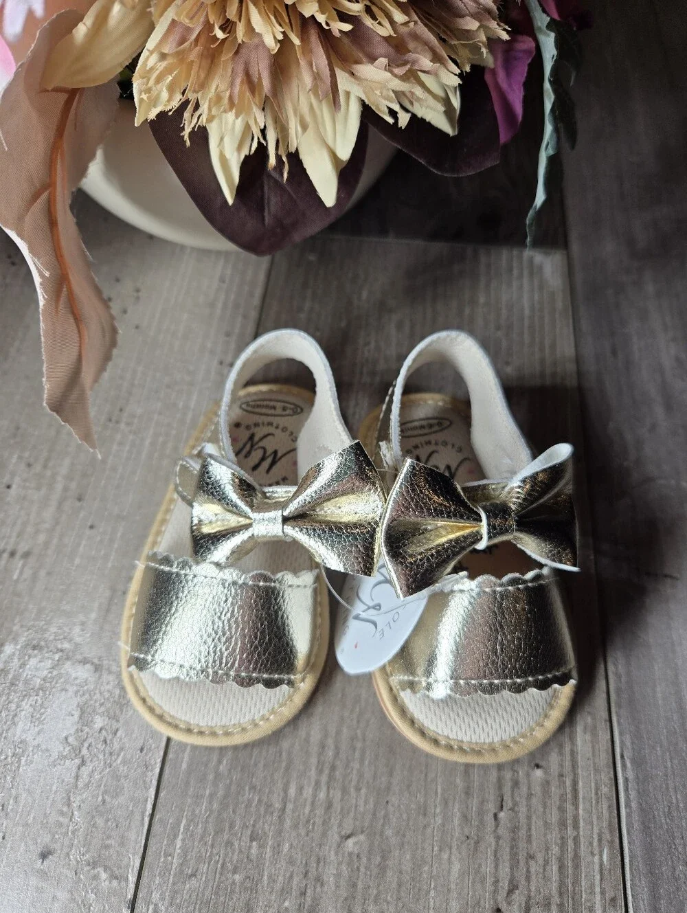 NWT Marie Nicole Metallic Gold Bow Baby Girl Sandals 0–6M